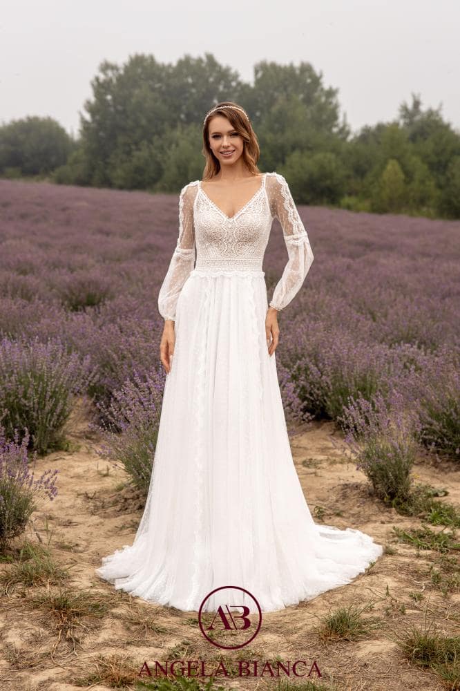 angela bianca_brautatelier ried_1060_brautkleid_boho_puenktchentuell_aermel_langarm_ivory_tuell__vorne_1-min