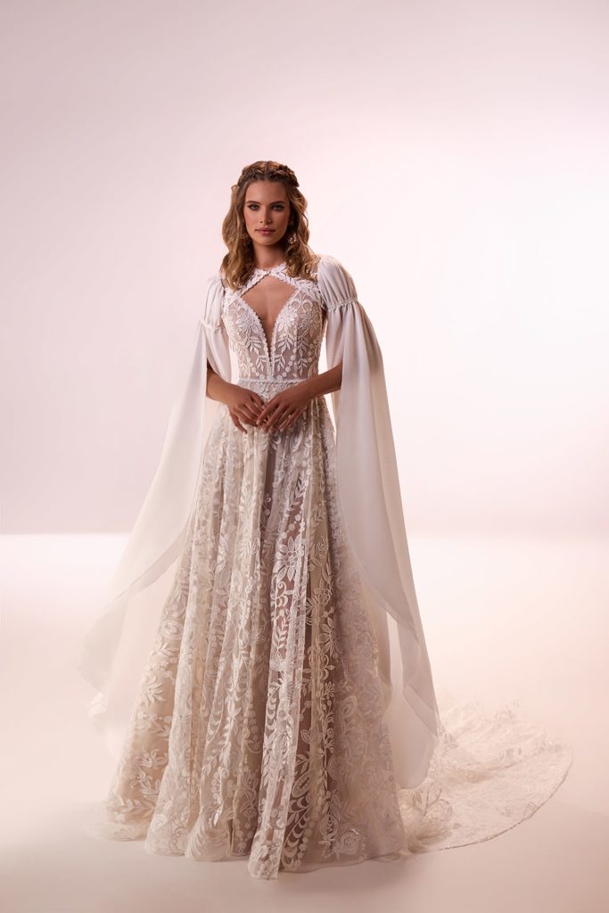 dama-couture_brautkleid_cassidy_all-over-boho-spitze_abnehmbares-cape_flugelaermel_vorne_2-1.jpg