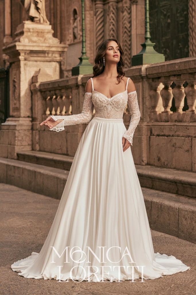 monica loretti_brautatelier ried_8317_brautkleid_a-linie_spitze_mit_pailetten_chiffonrock_armstulpen_vorne_ganz-min